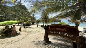 Koh Wua ta Lap Island sign on the beach