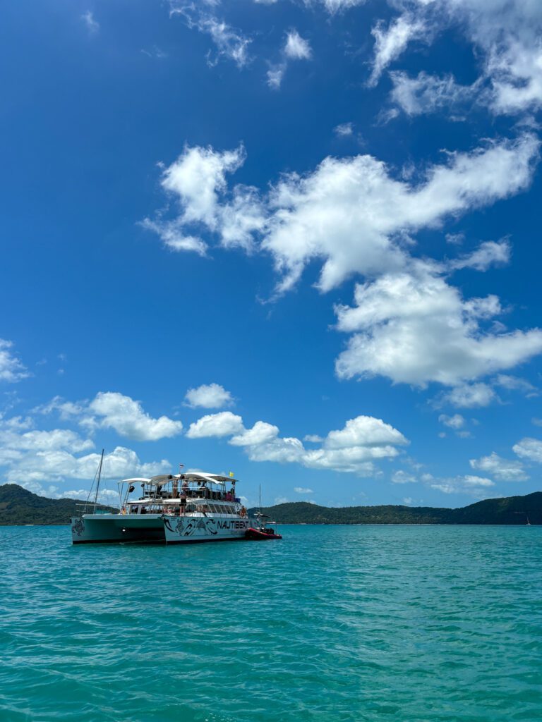 A luxury catamaran gliding through the Thai Gulf